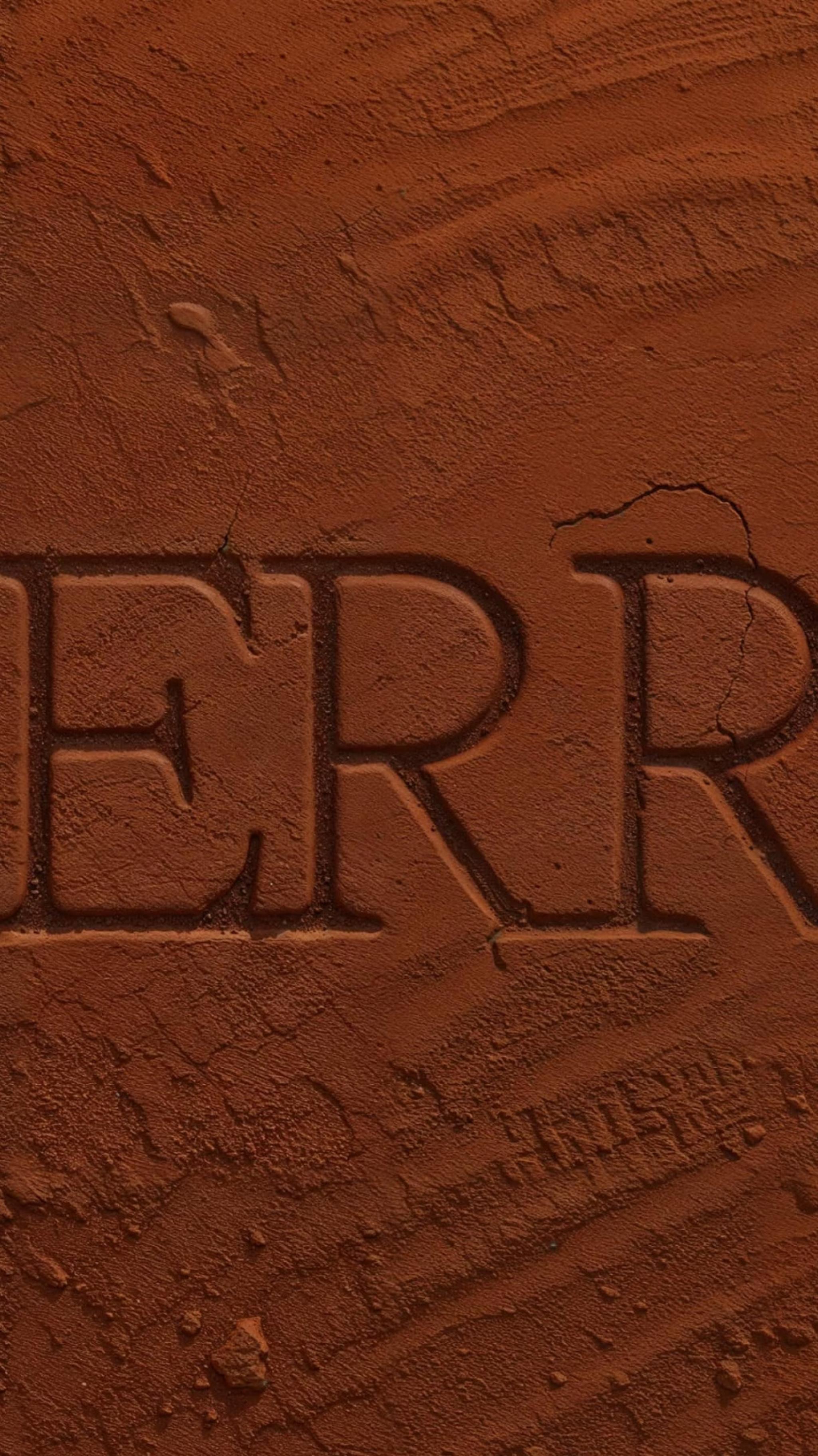 Nerra brand name embossed in terracotta clay texture
